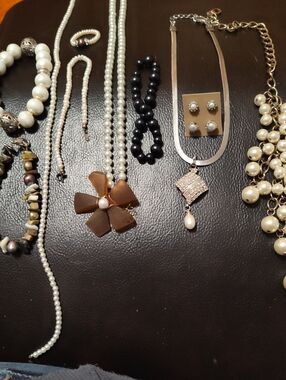 4 Necklaces 4 Bracelets 1 Ring 2 Earrings